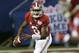 Alabama quarterback Blake Sims rolls out in the second half of an NCAA college football game against West Virginia Saturday, Aug. 30, 2014, in Atlanta. (AP Photo/John Bazemore)