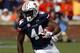 Auburn running back Cameron Artis-Payne (44) carries the ball for a first down against Arkansas during the first half of an NCAA college football game on Saturday, Aug. 30, 2014, in Auburn, Ala. (AP Photo/Butch Dill)