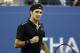 Roger Federer, of Switzerland, reacts after winning a point against Sam Groth, of Australia, during the second round of the U.S. Open tennis tournament Friday, Aug. 29, 2014, in New York. (AP Photo/Jason DeCrow)