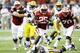 Wisconsin's Melvin Gordon runs for a 14-yard touchdown during the first half of an NCAA college football game against LSU Saturday, Aug. 30, 2014, in Houston. (AP Photo/David J. Phillip)