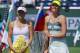 Maria Sharapova, of Russia, right, poses with the winner's trophy after defeating Caroline Wozniacki, left, of Denmark, 6-2, 6-2 in their match at the BNP Paribas Open tennis tournament, Sunday, March 17, 2013, in Indian Wells, Calif. (AP Photo/Mark J. Terrill)