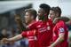 Liverpool's Raheem Sterling, center, celebrates with teammates Joe Allen, right, and Alberto Moreno after scoring against Tottenham Hotspur, during their English Premier League soccer match at White Hart Lane, London, Sunday, Aug. 31, 2014 (AP Photo/Bogdan Maran)