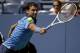 Grigor Dimitrov, of Bulgaria, returns a shot against Dudi Sela, of Israel, during the second round of the 2014 U.S. Open tennis tournament, Friday, Aug. 29, 2014, in New York. (AP Photo/Frank Franklin II)