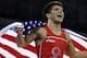 USA's Henry Cejudo celebrates his gold in 55 kilogram freestyle wrestling division after defeating Japan's Tomohiro Matsunaga in their gold medal match at the Beijing 2008 Olympics in Beijing, Tuesday, Aug. 19, 2008. (AP Photo/Ed Wray)
