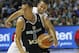 Argentina's Pablo Priogini, front, vies with Puerto Rico's Jose Barea, behind, during the Group B Basketball World Cup match between Argentina and Puerto Rico in Seville, Spain, Saturday, Aug. 30, 2014. The 2014 Basketball World Cup competition will take place in various cities in Spain from Aug. 30 through to Sept. 14. (AP Photo/Miguel Angel Morenatti)