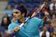 Roger Federer, of Switzerland, returns to Marcel Granollers, of Spain, during the third round of the 2014 U.S. Open tennis tournament, Sunday, Aug. 31, 2014, in New York. (AP Photo/Elise Amendola)