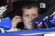NASCAR driver Kasey Kahne gets ready to practice for Sunday's NASCAR auto race at Atlanta Motor Speedway in Hampton, Ga., Friday, August 29, 2014. (AP Photo/David Tulis)