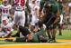 Aug 31, 2014; Waco, TX, USA; Baylor Bears quarterback Bryce Petty (14) appears to be injured as he scores a touchdown against the Southern Methodist Mustangs during the first half at McLane Stadium. Mandatory Credit: Jerome Miron-USA TODAY Sports