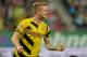 Dortmund's Marco Reus celebrates after scoring during the soccer match between FC Augsburg and Borussia Dortmund in the SLG Arena in Augsburg, Germany, on Friday, Aug. 29, 2014. (AP Photo/Kerstin Joensson)