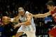 Argentina's Walter Herrmann, left, drives to the basket against Croatia's Damjan Rudez, right, during the Group B Basketball World Cup match between Argentina and Croatia in Seville, Spain, Sunday, Aug. 31, 2014. The 2014 Basketball World Cup competition will take place in various cities in Spain from Aug. 30 through to Sept. 14. (AP Photo/Miguel Angel Morenatti)