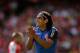 AS Monaco's Radamel Falcao applauds a teammate during the Emirates Cup soccer match between Arsenal and AS Monaco at Arsenal's Emirates Stadium, London, Sunday, Aug. 3, 2014. (AP Photo/Matt Dunham)