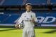 Mexico international soccer player Javier Hernandez 'Chicharito', poses during his official presentation at the Santiago Bernabeu stadium in Madrid, Spain, Monday, Sept. 1, 2014, after signing for Real Madrid. (AP Photo/Andres Kudacki)