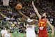 Brazil's Larry Taylor, left, shoots over Spain's Sergio Rodriguez during the Group A Basketball World Cup match between Brazil and Spain in Granada, Spain, Monday Sept. 1, 2014. The 2014 Basketball World Cup competition will take place in various cities in Spain from Aug. 30 through to Sept. 14. (AP Photo/Daniel Tejedor)
