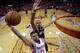 Houston Rockets' Chandler Parsons (25) goes up for a shot as Portland Trail Blazers' Nicolas Batum defends during the first half in Game 1 of an opening-round NBA basketball playoff series, Sunday, April 20, 2014, in Houston. (AP Photo/David J. Phillip)