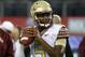 Florida State quarterback Jameis Winston (5) throws a pass during warm ups before an NCAA college football game against Oklahoma State, Saturday, Aug. 30, 2014, in Arlington, Texas. (AP Photo/Tony Gutierrez)