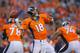 DENVER, CO - AUGUST 23: Quarterback Peyton Manning #18 of the Denver Broncos throws against the Houston Texans during a preseason game at Sports Authority Field at Mile High on August 23, 2014 in Denver, Colorado. (Photo by Justin Edmonds/Getty Images)