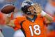 Denver Broncos quarterback Peyton Manning (18) warms up prior to an NFL preseason football game against the Houston Texans, Saturday, Aug. 23, 2014, in Denver. (AP Photo/Jack Dempsey)