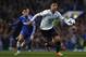 Chelsea's Eden Hazard, left, competes with Tottenham Hotspur's Kyle Walker during their English Premier League soccer match at Stamford Bridge, London, Saturday, March 8, 2014. (AP Photo/Sang Tan)