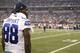 Dallas Cowboys wide receiver Dez Bryant watches from the sidelines in the first half of a NFL preseason football game against the Denver Broncos, Thursday, Aug. 28. 2014, in Arlington, Texas. (AP Photo/Brandon Wade)