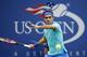 Roger Federer, of Switzerland, returns a shot against Marcel Granollers, of Spain, during the third round of the 2014 U.S. Open tennis tournament, Sunday, Aug. 31, 2014, in New York. (AP Photo/Kathy Willens)
