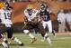Cleveland Browns running back Ben Tate (44) runs for a 1-yard touchdown against the Chicago Bears in the first quarter of a preseason NFL football game Thursday, Aug. 28, 2014, in Cleveland. (AP Photo/Tony Dejak)