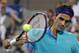 Roger Federer, of Switzerland, returns the ball against Marcel Granollers, of Spain, during the third round of the U.S. Open tennis tournament, Sunday, Aug. 31, 2014, in New York. (AP Photo/Elise Amendola)