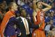 Clemson players Jonah Baize, left, Milton Jennings (24) and assistant coach Earl Grant react to a call by an official that went against them during the second half of an East Regional second round NCAA tournament college basketball game against West Virginia in Tampa, Fla., Thursday, March 17, 2011. West Virginia won 84-76. (AP Photo/John Raoux)