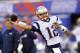 New England Patriots quarterback Tom Brady throws before an NFL football game between the New England Patriots and the New York Giants, Thursday, Aug. 28, 2014, in East Rutherford, N.J. (AP Photo/Bill Kostroun)