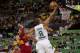 Brazil's Alex Garcia, right, shoots over Spain's Pau Gasol during the Group A Basketball World Cup match between Brazil and Spain in Granada, Spain, Monday Sept. 1, 2014. The 2014 Basketball World Cup competition will take place in various cities in Spain from Aug. 30 through to Sept. 14. (AP Photo/Daniel Tejedor)