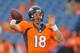DENVER, CO - AUGUST 23: Quarterback Peyton Manning #18 of the Denver Broncos throws as he warms up before a preseason game at Sports Authority Field at Mile High on August 23, 2014 in Denver, Colorado. (Photo by Justin Edmonds/Getty Images)