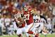 Kansas City Chiefs tight end Travis Kelce (87) runs for a touchdown reception in the first half of an NFL preseason football game against the Cincinnati Bengals Thursday, Aug. 7, 2014, in Kansas City, Mo. (AP Photo/Ed Zurga)