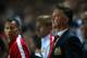 MILTON KEYNES, ENGLAND - AUGUST 26: Manager Louis van Gaal of Manchester United looks dejected with assistant Ryan Giggs (L) after the Capital One Cup second round match between MK Dons and Manchester United at Stadium mk on August 26, 2014 in Milton Keynes, England. (Photo by Clive Mason/Getty Images)