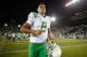 EUGENE, OR - AUGUST 30: Quarterback Marcus Mariota #8 of the Oregon Ducks heads off the field after defeating the South Dakota Coyotes 62-13 at Autzen Stadium on August 30, 2014 in Eugene, Oregon. (Photo by Otto Greule Jr/Getty Images)