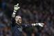 Barcelona goalkeeper Victor Valdes is seen during his team's Champions League first knock out round soccer match against Manchester City at the Etihad Stadium, Manchester, England, Tuesday Feb. 18, 2014. (AP Photo/Jon Super)