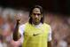 AS Monaco substitute Radamel Falcao gives a thumbs up to fans as he warms up on the sideline during the second half of the Emirates Cup soccer match between AS Monaco and Valencia at Arsenal's Emirates Stadium in London, Saturday, Aug. 2, 2014. (AP Photo/Matt Dunham)