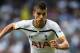 LONDON, ENGLAND - AUGUST 31: Erik Lamela of Spurs runs with the ball during the Barclays Premier League match between Tottenham Hotspur and Liverpool at White Hart Lane on August 31, 2014 in London, England. (Photo by Jamie McDonald/Getty Images)