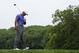 Tiger Woods react to a poor tee shot on the second hole during the first round of the PGA Championship golf tournament at Valhalla Golf Club on Thursday, Aug. 7, 2014, in Louisville, Ky. (AP Photo/John Locher)