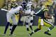 Seattle Seahawks' Brandon Browner tries to tackle Green Bay Packers' Jarrett Boykin during the first half of an NFL preseason football game Friday, Aug. 23, 2013, in Green Bay, Wis. (AP Photo/Morry Gash)