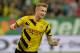 Dortmund's Marco Reus celebrates after scoring during the soccer match between FC Augsburg and Borussia Dortmund in the SLG Arena in Augsburg, Germany, on Friday, Aug. 29, 2014. (AP Photo/Kerstin Joensson)