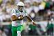 Oregon quarterback Marcus Mariota (8) runs with the football during the second quarter of an NCAA college football game in Eugene, Ore., Saturday, Aug. 30, 2014 (AP Photo/Ryan Kang)