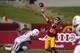 Southern California quarterback Cody Kessler, right, passes under pressure from Fresno State defensive end Todd Hunt during the first half of an NCAA college football game, Saturday, Aug. 30, 2014, in Los Angeles. (AP Photo/Mark J. Terrill)