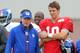 Aug 7, 2013; East Rutherford, NJ, USA; New York Giants head coach Tom Coughlin (left) with quarterback Eli Manning (10) during team practice at the Quest Diagnostics Training Center. Mandatory Credit: Brad Penner-USA TODAY Sports