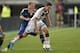 Argentina's Javier Mascherano, left, and Germany's Julian Draxler challenge for the ball during the friendly soccer match between Germany and Argentina in Duesseldorf, Germany, Wednesday, Sept. 3, 2014. (AP Photo/Martin Meissner)