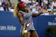 NEW YORK, NY - SEPTEMBER 03: Serena Williams of the United States returns a shot against Flavia Pennetta of Italy during their women's singles quarterfinal match on Day Ten of the 2014 US Open at the USTA Billie Jean King National Tennis Center on September 3, 2014 in the Flushing neighborhood of the Queens borough of New York City. (Photo by Streeter Lecka/Getty Images)