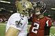 New Orleans Saints quarterback Drew Brees (9) speaks with Atlanta Falcons quarterback Matt Ryan (2) after the second half of an NFL football game, Thursday, Nov. 21, 2013, in Atlanta. The New Orleans Saints won 17-13. (AP Photo/David Goldman)