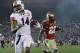 FILE - In this Jan. 6, 2014, file photo, Auburn's Nick Marshall (14) gets past Florida State's Telvin Smith (22) for a touchdown run during the first half of the NCAA BCS National Championship college football game in Pasadena, Calif. Marshall is expected to have another big season after passing for 1,976 yards, running for 1,068 and accounting for 26 touchdowns while leading the Tigers to the final BCS national championship game last year. (AP Photo/David J. Phillip, File)