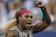 Serena Williams, of the United States, gestures after defeating Flavia Pennetta, of Italy, 6-3, 6-2 in the quarterfinals of the U.S. Open tennis tournament Wednesday, Sept. 3, 2014, in New York. (AP Photo/Darron Cummings)