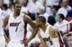 Miami Heat center Chris Bosh (1) and guard Dwyane Wade (3) talk as they fall behind the Indiana Pacers during the first half of Game 3 in the NBA basketball Eastern Conference finals playoff series, Saturday, May 24, 2014, in Miami. (AP Photo/Lynne Sladky)