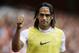 FILE - This is a Saturday, Aug. 2, 2014 file photo of AS Monaco player Radamel Falcao as he gives a thumbs up to fans as he warms up on the sideline during the second half of the Emirates Cup soccer match between AS Monaco and Valencia at Arsenal's Emirates Stadium in London. Radamel Falcao is set to join Manchester United on loan after the Premier League club agreed to a loan deal with Monaco, a person with knowledge of the deal said Monday Sept. 1, 2014. (AP Photo/Matt Dunham, File)