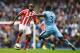 MANCHESTER, ENGLAND - AUGUST 30: Victor Moses of Stoke City takes on Bacary Sagna of Manchester City during the Barclays Premier League match between Manchester City and Stoke City at Etihad Stadium on August 30, 2014 in Manchester, England. (Photo by Shaun Botterill/Getty Images)